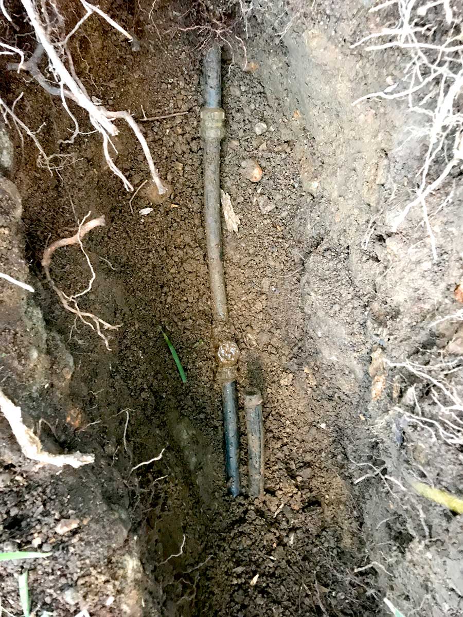 Leaking underground mains water pipe